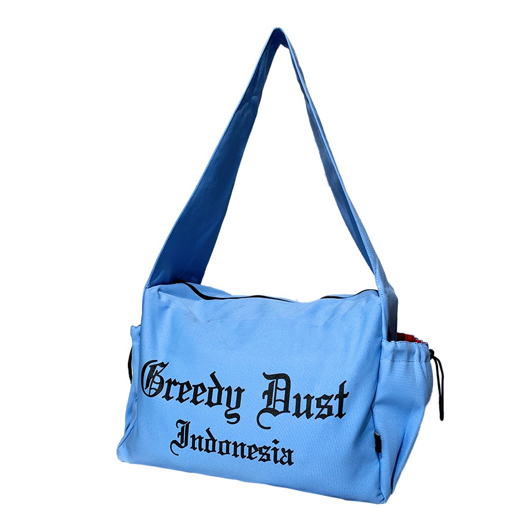 50a Greedy Dust Indonesia Sling Pocket Totebag Blue 1 Greedy Dust Indonesia Sling Totebag Blue - Image 1